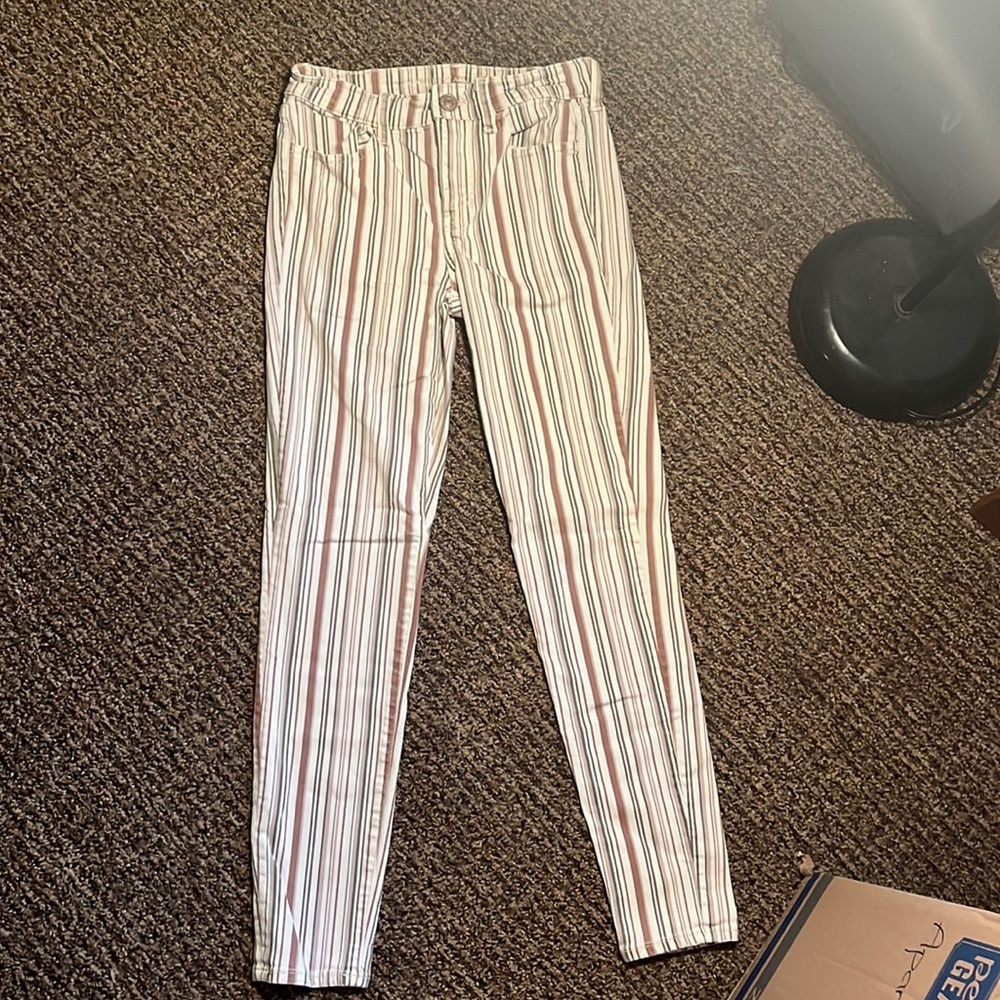 American Eagle Next Level Stretch pants with pink, green, and maroon stripes.